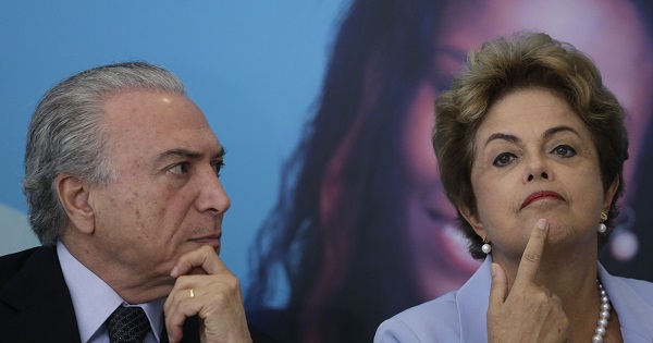 Former President Dilma Rousseff and then-Vice President Michel Temer announce a new electricity investment plan in Brasilia, Aug. 11, 2015.