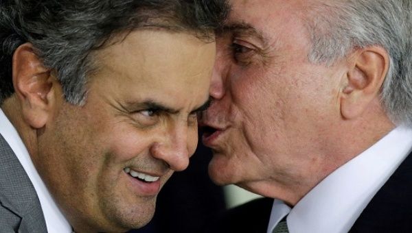 Brazil's Temer talks with Senator Neves during a ceremony where he made his first public remarks after the vote to impeach President Rousseff.