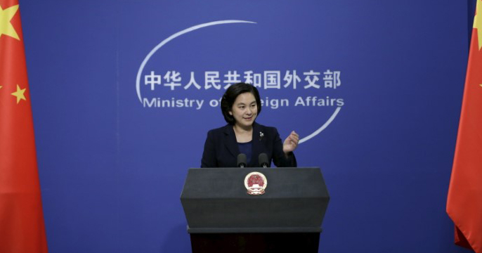 Hua Chunying, spokeswoman of China's Foreign Ministry, gestures at a regular news conference in Beijing, China, Jan. 6, 2016.