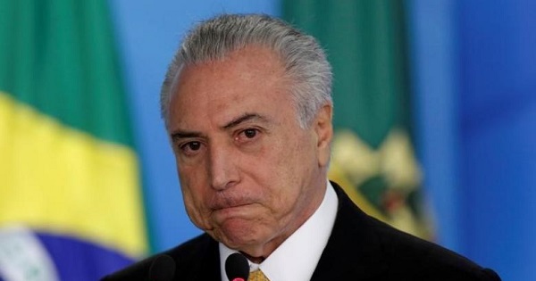 Amidst scandals, Brazil's un-elected neoliberal president refused to step down Thursday.