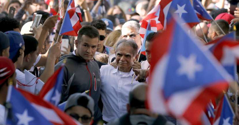 Puerto Rican independence fighter Oscar Lopez Rivera arrives for a gathering in his honor in Chicago's Humboldt Park neighborhood.
