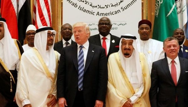 Qatar's Emir Sheikh Tamim Bin Hamad Al-Thani poses with Trump and Gulf allies.