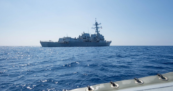 Arleigh Burke-class guided-missile destroyer USS Dewey transits the South China Sea.