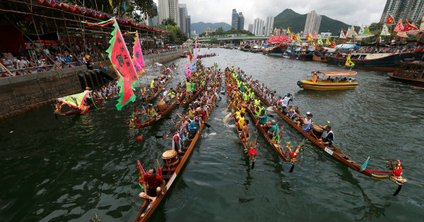 The Dragon Boat Festival, or Tuen Ng Festival, is held on the fifth day of the fifth month of the lunar calendar.