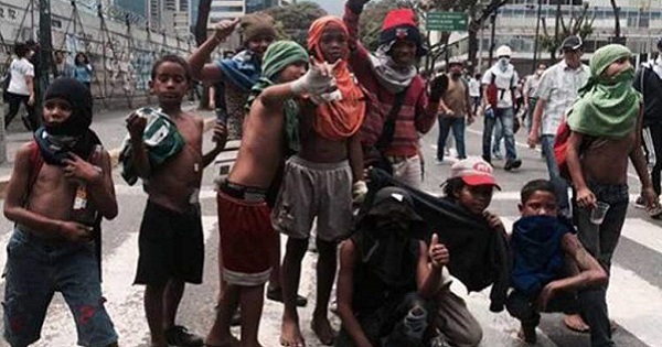 Children taking part in opposition protests in Venezuela.