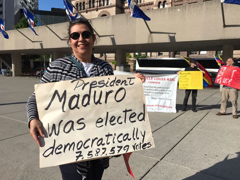 The Canadian protesters waved signs reminding the public President Maduro was democratically elected to counter claims the Venezuelan president is a dictator.