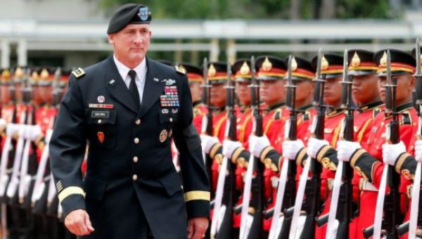 A military parade welcomed General Robert B. Brown.