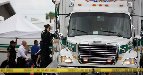 Investigators work the scene of a fatal workplace shooting in Orlando, Florida, June 5, 2017.