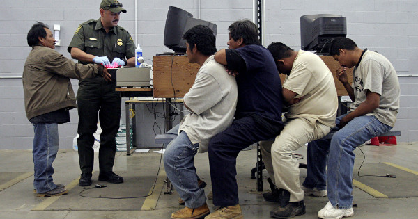 Immigrants being processed in the United States