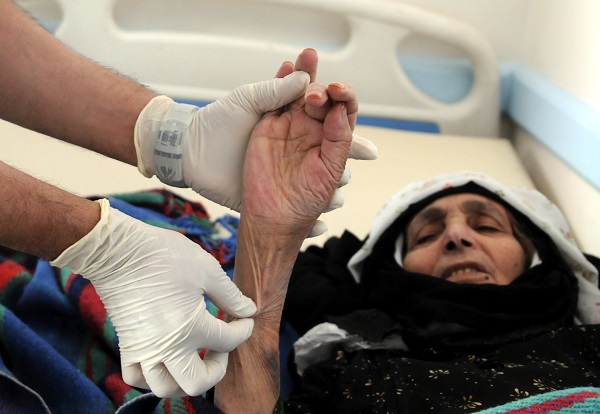 A woman with cholera receives treatment in Sanaa, Yemen, June 6 2017.