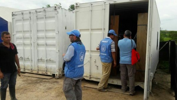 Members of the United Nations mission in Colombia overseeing the delivery of arms.