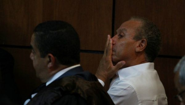 Angel Rondon (R), Odebrecht's commercial representative in the Dominican Republic, looks on to the judge's ruling.