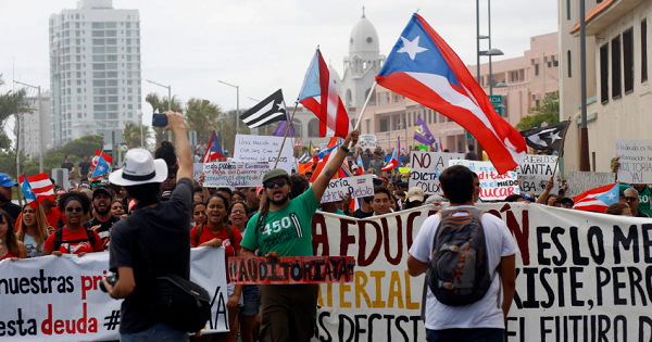 University students march against budget cuts in San Juan.