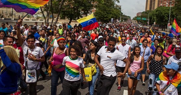 LGBTI community members and activists march in Caracas, June 29, 2014.