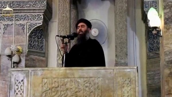 A man purported to be the reclusive leader of the militant Islamic State group Abu Bakr al-Baghdadi in what would have been his first public appearance.