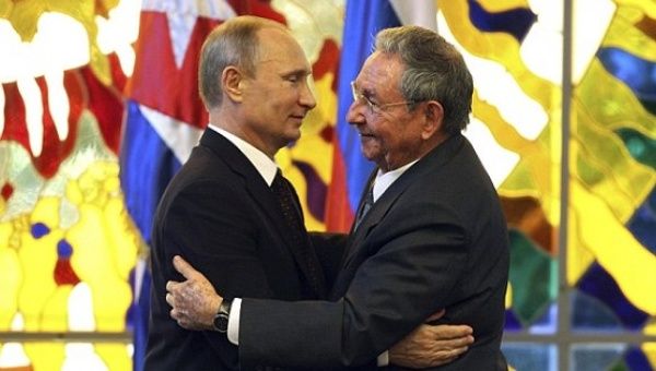 Russia's Vladimir Putin embraces Cuba's Raul Castro in Havana.