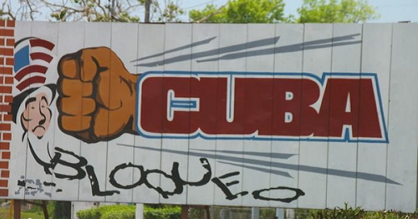 Billboard against U.S. blockade of Cuba.