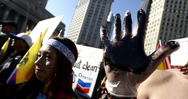 Ecuadorean demonstrators take part in a protest over the case against Chevron, New York, U.S. 15, October, 2013