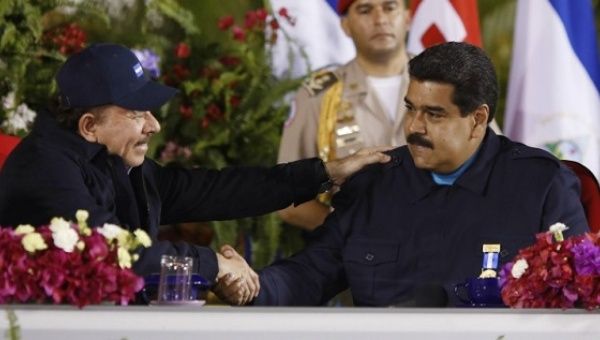 President of Nicaragua, Daniel Ortega (L), expresses solidarity with the Bolivarian Republic of Venezuela following this week's OAS battles.