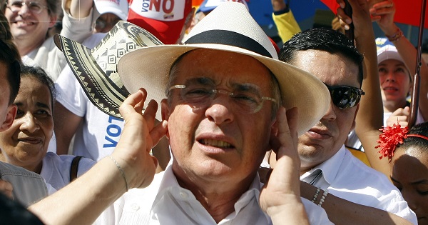 Far-right senator and former president, Alvaro Uribe, leads a march against Colombia's peace deal in Cartagena, Sept. 26, 2016.