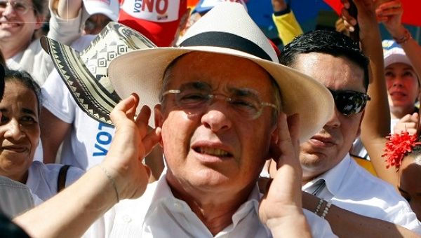 Far-right senator and former president, Alvaro Uribe, leads a march against Colombia's peace deal in Cartagena, Sept. 26, 2016.