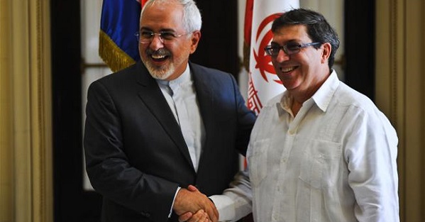 Iran's Foreign Minister Mohammad Javad Zarif (L) shakes hands with his Cuban counterpart Bruno Rodriguez in Havana, on Aug. 22, 2016.
