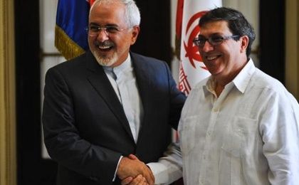 Iran's Foreign Minister Mohammad Javad Zarif (L) shakes hands with his Cuban counterpart Bruno Rodriguez in Havana, on Aug. 22, 2016. 
