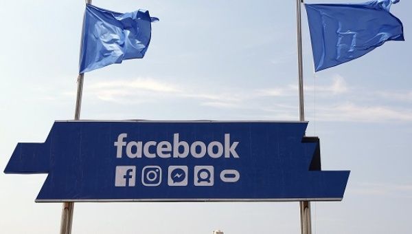 The logo of the social network Facebook is seen on a beach during the Cannes Lions Festival in Cannes.