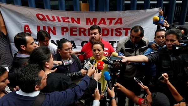 Frida Ortiz, wife of reporter Salvador Adame Pardo, speaks to the media during a protest against the May 18 disappearance of Adame.