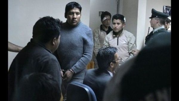 Three of the nine state officers detained in Chile since March 19.
