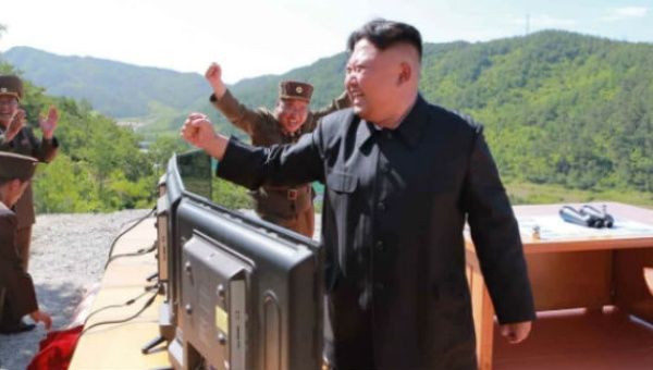 North Korean leader Kim Jong-un reacts during the test-fire of intercontinental ballistic missile.
