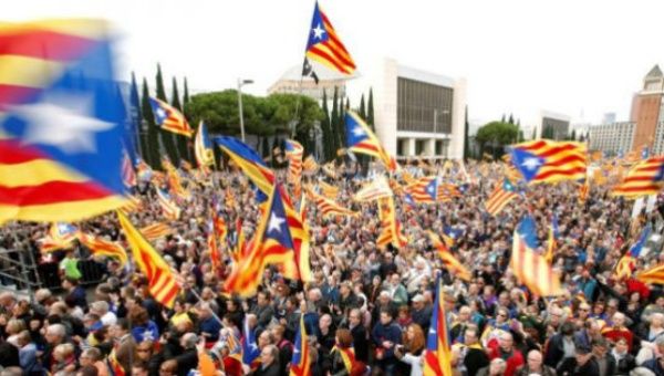 People hold Catalan separatist flags known as ''Esteladas.