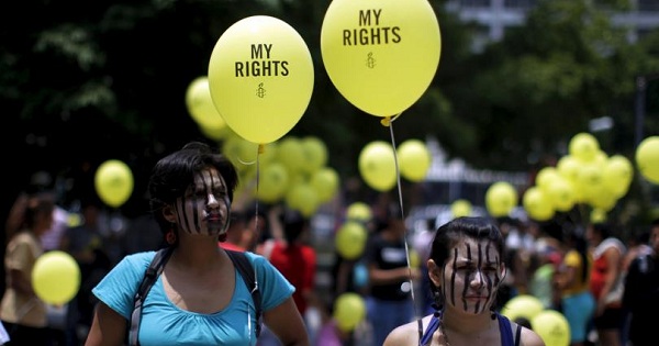 Women take part in a demonstration against anti-abortion laws in San Salvador on April 22, 2015.