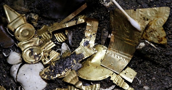 Gold pieces formed into symbols are seen at a site at one of the main Aztec temples, in Mexico City, Mexico, June 22, 2017