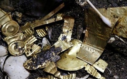 Gold pieces formed into symbols are seen at a site at one of the main Aztec temples, in Mexico City, Mexico, June 22, 2017