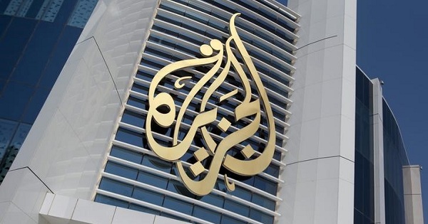The logo of Al Jazeera Media Network is seen on its headquarters in Doha, Qatar, on June 8, 2017.