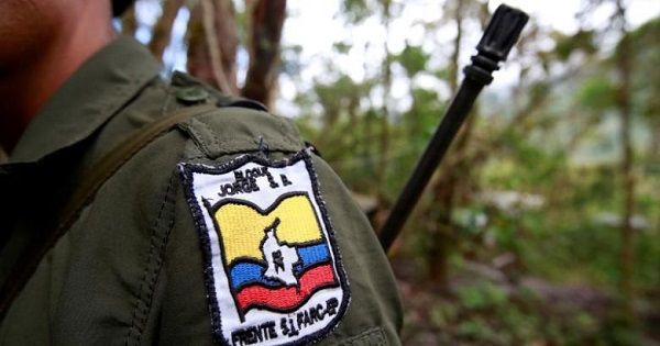A member of the 51st Front of the Revolutionary Armed Forces of Colombia, FARC, is seen at a camp in Cordillera Oriental, Colombia.