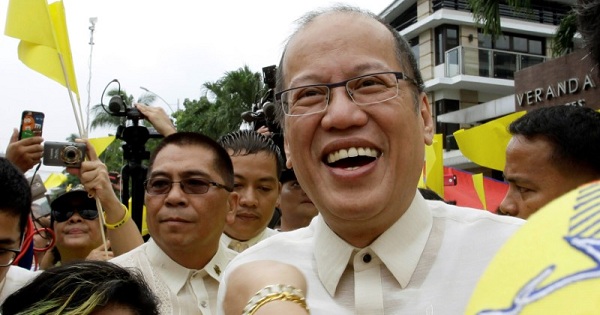 Former Philippine President Benigno Aquino smiles as he is welcomed by supporters in Quezon city, metro Manila, Philippines, on June 30, 2016.
