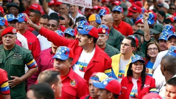 Venezuelan President Nicolas Maduro joined by hundreds of supporters at a Caracas rally.