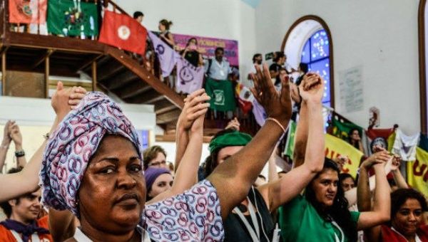 Via Campesina members meet during the organization's seventh International Conference.