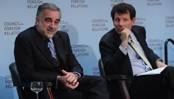 Luis Moreno Ocampo (L) discusses human rights with New York Times columnist Nicholas Kristof (R)  at the CFR Symposium on International Law and Justice sponsored by the Pitt-Jolie Foundation.