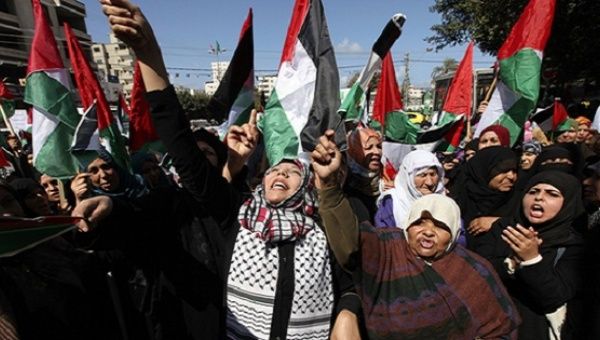 Women protest the Israeli occupation of Palestine.
