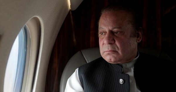 Pakistani Prime Minister Nawaz Sharif looks out the window of his plane on February 3, 2017.