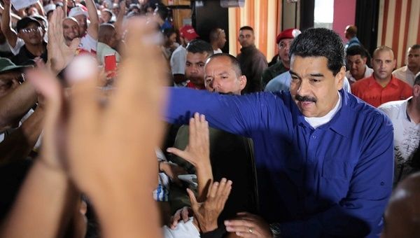 Venezuela's President Nicolas Maduro greets supporters during a meeting in Caracas, Venezuela July 29, 2017