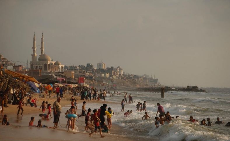 The temperature can reach as high as 95 Fahrenheit, so desperate families head to the beach to cool off. The power cuts mean the waste treatment plants aren't functioning well. Raw sewage has been dumped along the coast, 75 percent of the seawater is believed to be polluted.