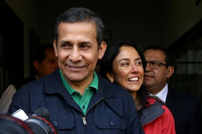 Peru's former President Ollanta Humala and former first lady Nadine Heredia leave the Nationalist Party headquarters in Lima, Peru, July 13, 2017.