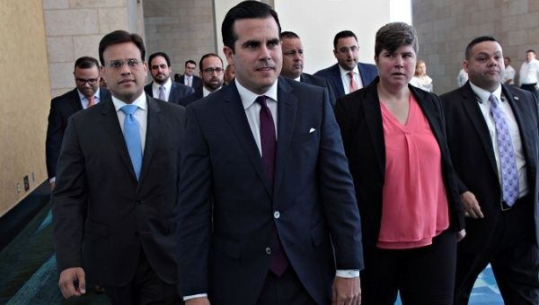 Puerto Rico's Governor Ricardo Rossello (C) arrives for a meeting of the Financial Oversight and Management Board in San Juan, Puerto Rico, on March 31, 2017.