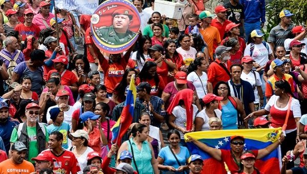 Venezuelans march in support of their Bolivarian Revolution.