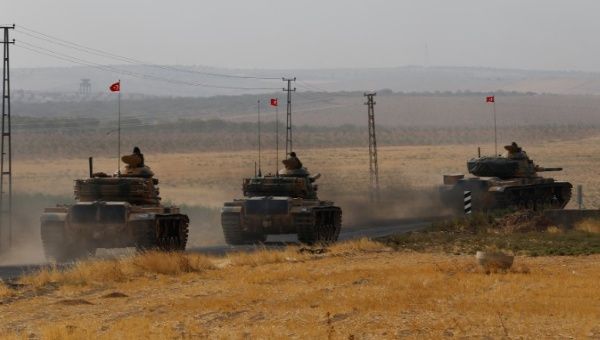 Turkish army tanks drive towards to the border in Karkamis on the Turkish-Syrian border in the southeastern Gaziantep province, Turkey, August 25, 2016. 