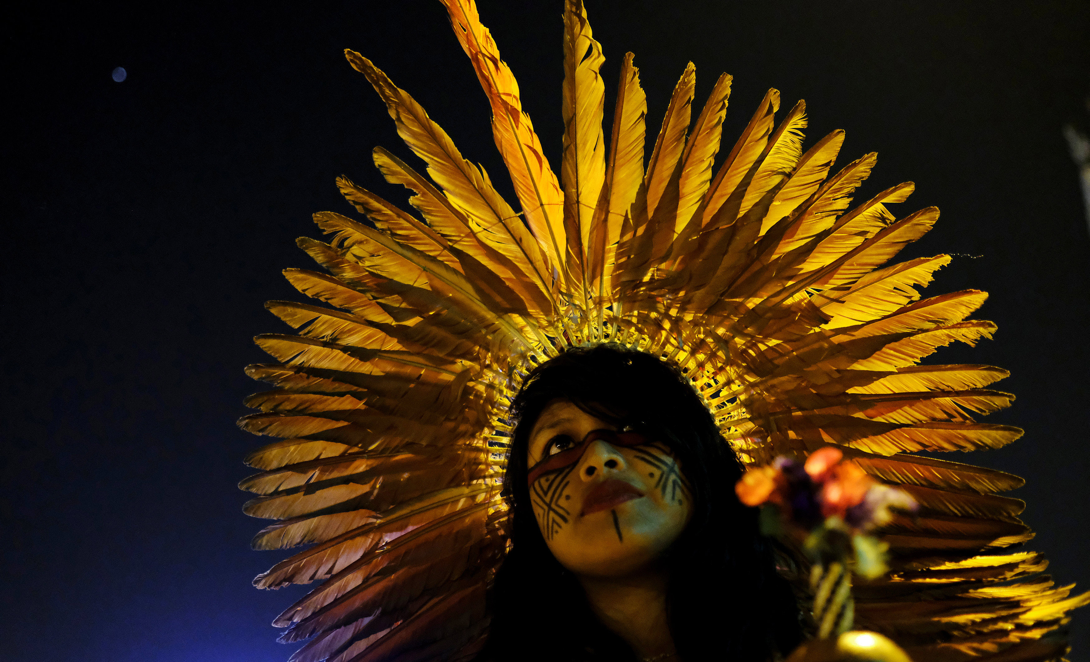 A Guarani Indian woman takes part in a protest by black and indigenous women against racism and machismo in Sao Paulo, Brazil, July 25, 2017.